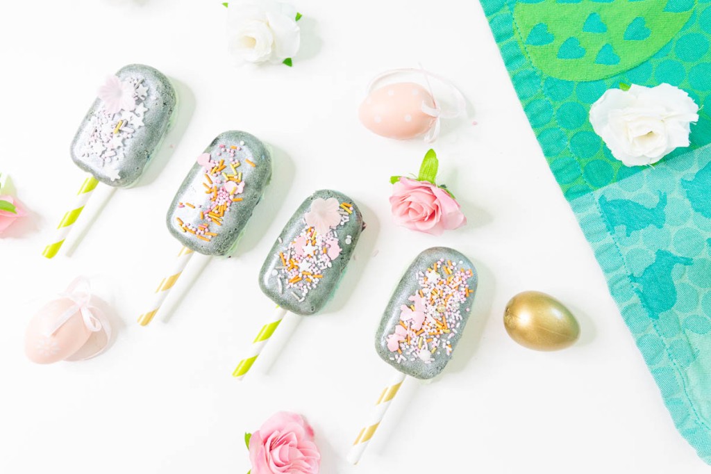magical easter cakesicles with colorful sprinkles and white chocolate